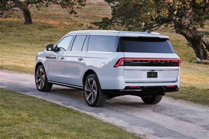 With His Lincoln Navigator